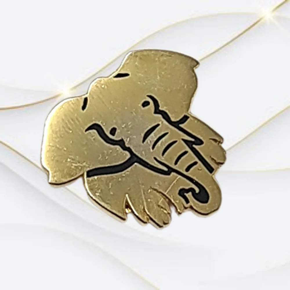 Gold Tone Elephant with Magnetics Snap on the Back